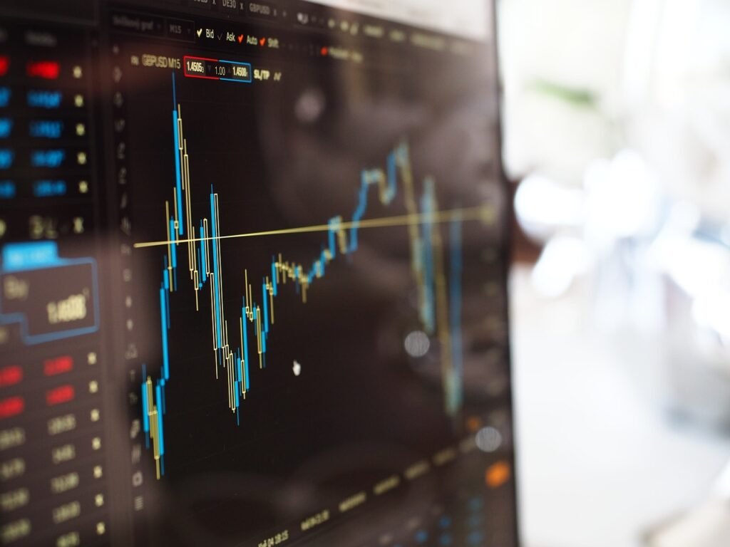 A confident financial advisor explains wealth protection strategies to a client, with graphs and charts showing inflation trends in the background.